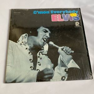 Elvis presley vintage 12 inch vinyl record
C’mon everybody rock and roll